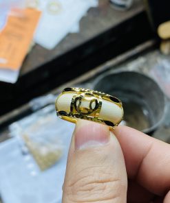 nhẫn ngà voi gắn kim tiền vàng 18k